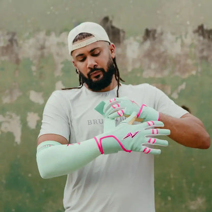 Fernando Tatis Jr. Signature Series Long Cuff Batting Gloves - Mint/Pink