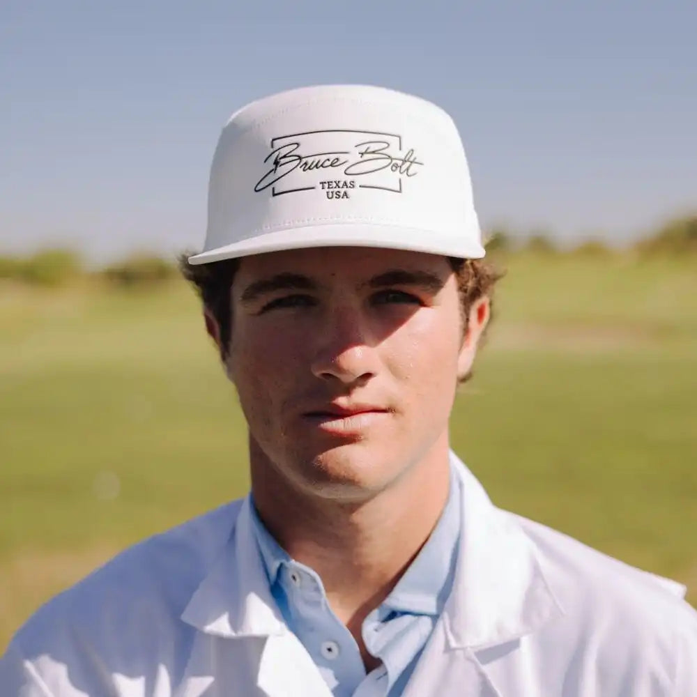 "BRUCE BOLT" Golf Performance Snapback Hat - White